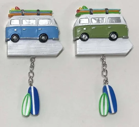 Resin camper van souvenir magnet with a roof rack and a hanging surfboard charm, in two colourways.