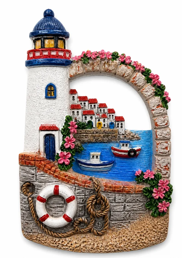 Resin souvenir magnet of a lighthouse above a stone arch with a lifebuoy and rope detail.