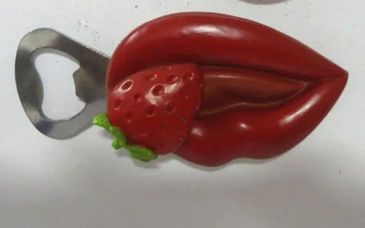 Resin bottle-opener fridge magnet moulded and painted as a red pepper.