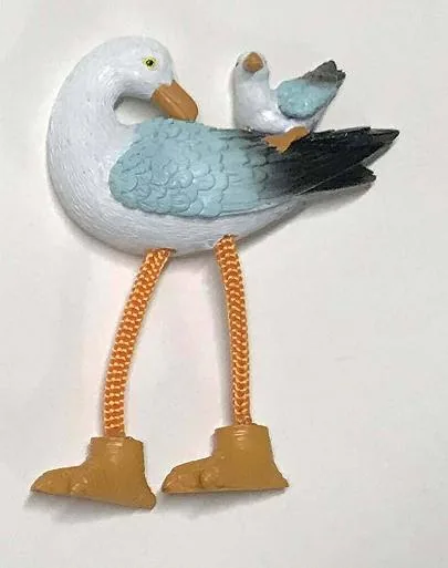Resin souvenir magnet of a seagull pair with hand-painted dangling rope legs.